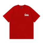 The T-shirt is an EVISU short-sleeve tee featuring a skull and large "M" print.