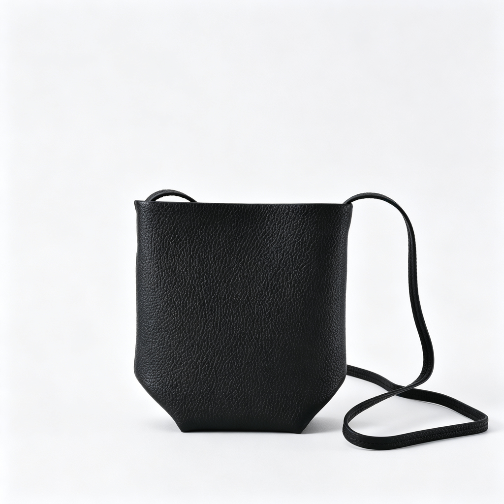 The Row N/S Park Mini Bucket Bag – Minimalist Leather Crossbody with Adjustable Strap,