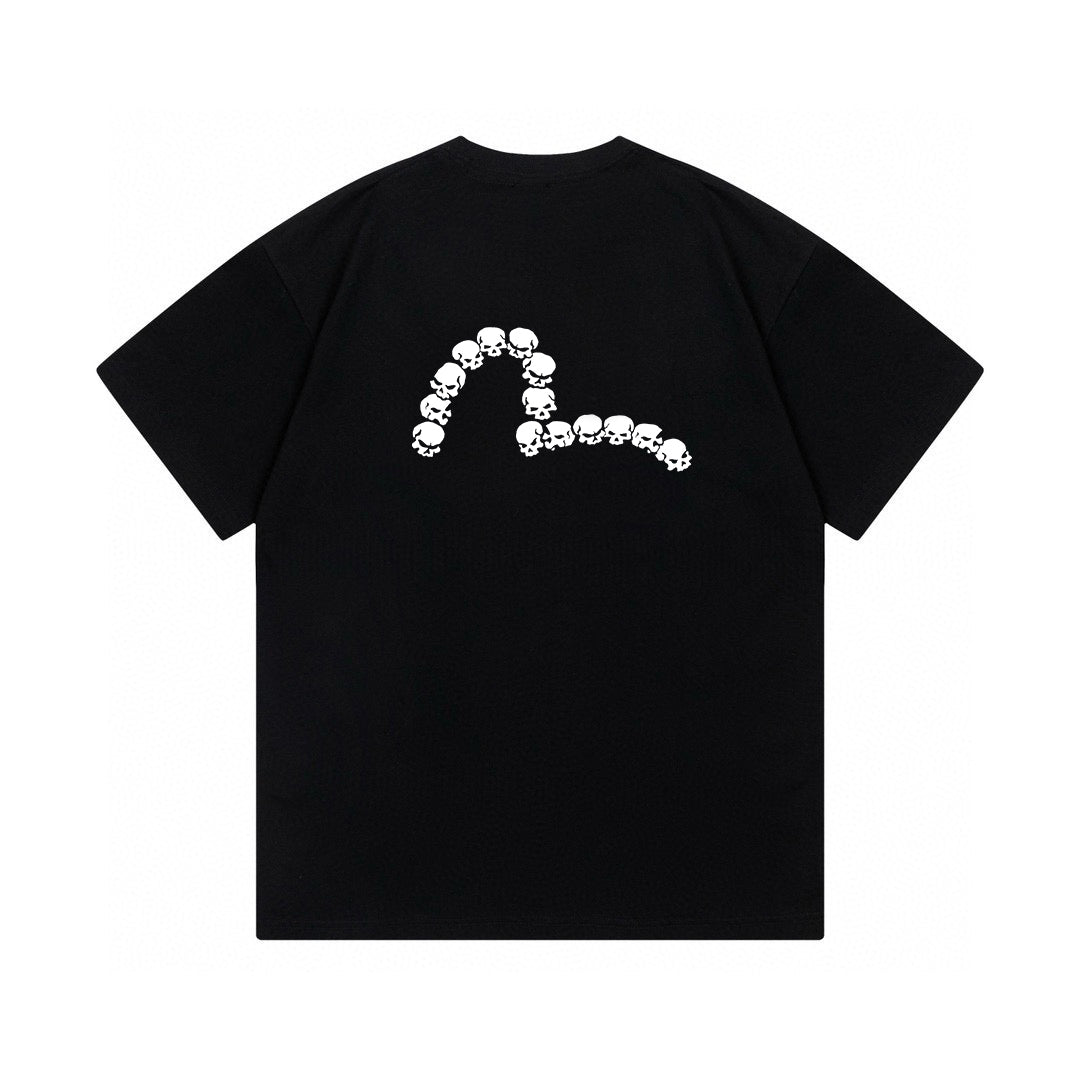 The T-shirt is an EVISU short-sleeve tee featuring a skull and large "M" print.