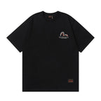 The EVISU Heritage & Co. series classic T-shirt is...