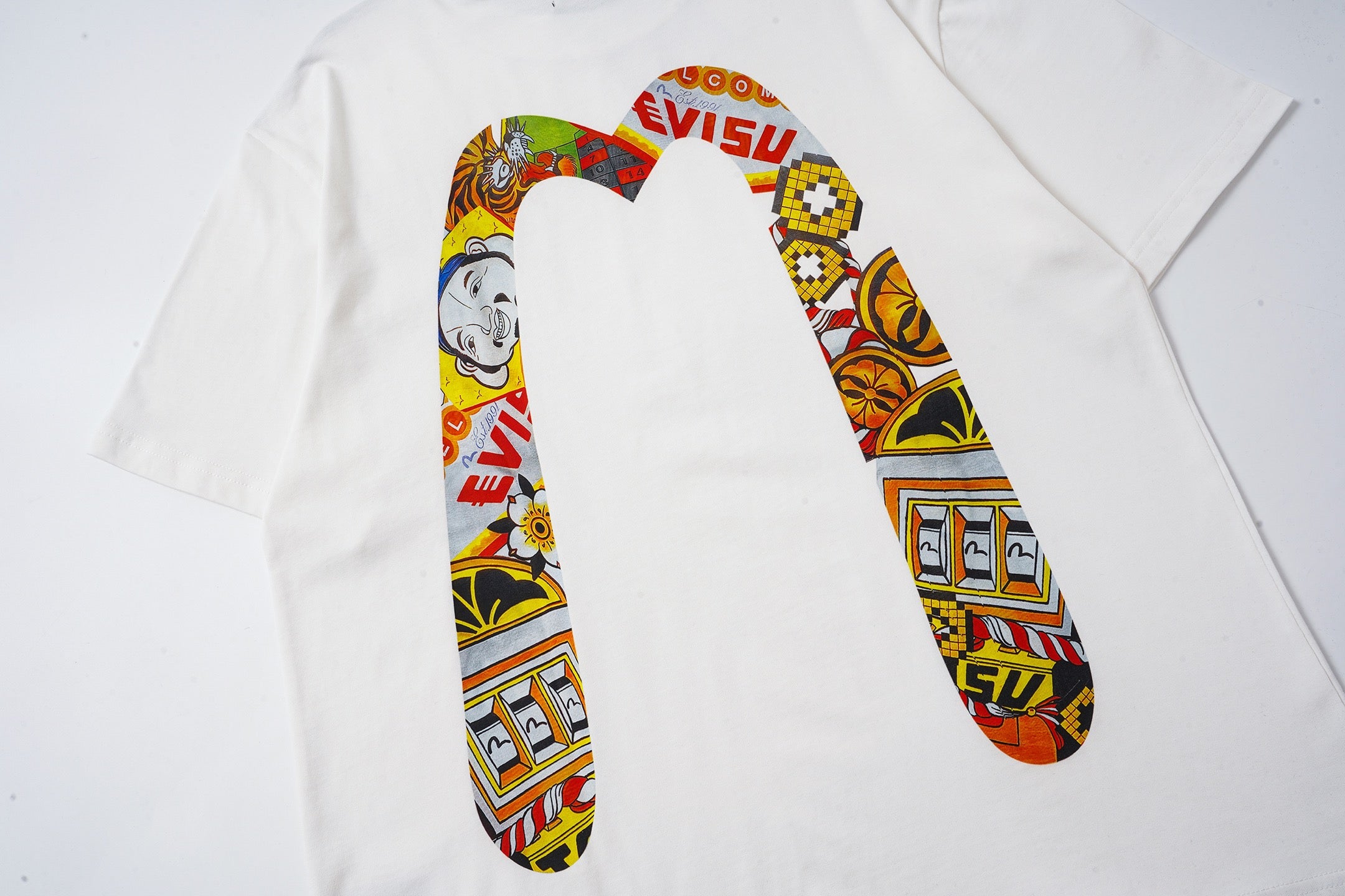 EVISU "Lucky Slot Machine" Themed Short-Sleeve T-Shirt with Large "M" Print