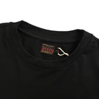 The T-shirt is from EVISU's "Heart-Hand Buddha Head" series.