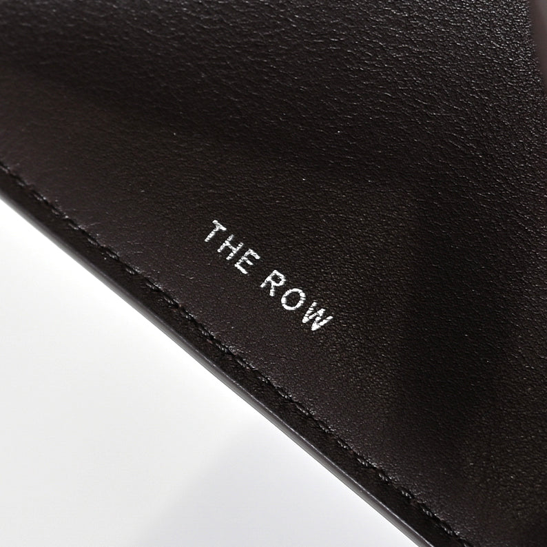 The Row Margaux 15 Smooth Calfskin Handbag | Large Leather Tote with Side Buckles | Black / Dark Chocolate