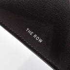 The Row Margaux 15 Smooth Calfskin Handbag | Large Leather Tote with Side Buckles | Black / Dark Chocolate