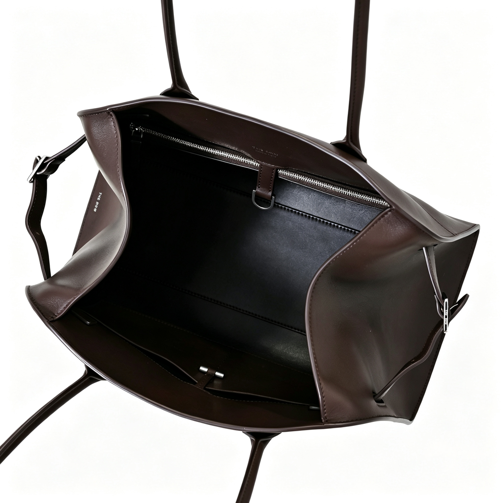 The Row Margaux 15 Smooth Calfskin Handbag | Large Leather Tote with Side Buckles | Black / Dark Chocolate