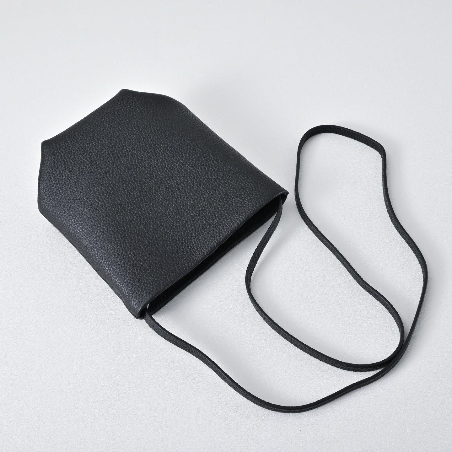 The Row N/S Park Mini Bucket Bag – Minimalist Leather Crossbody with Adjustable Strap,