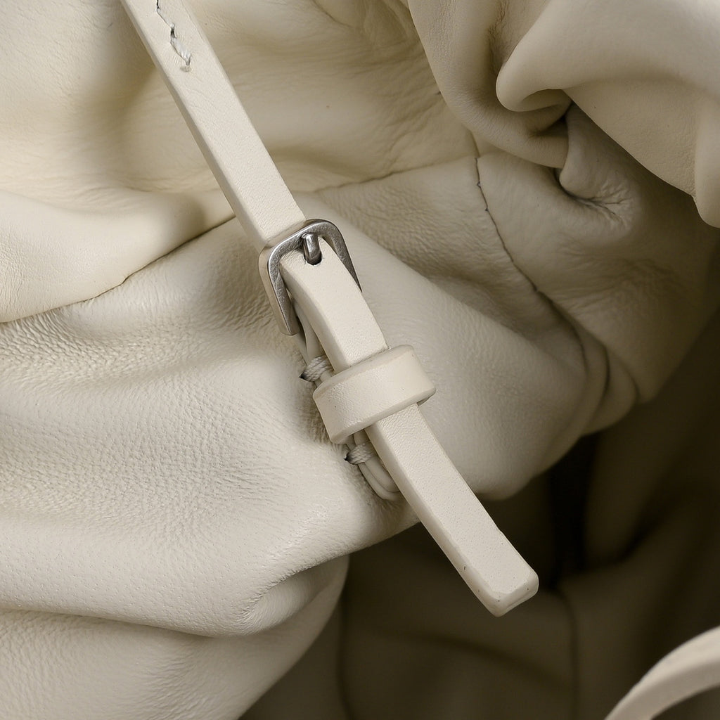 The Row Bourse Small Grained Leather Bag | 23cm Drawstring Dumpling Bag | Cream Pebbled Calfskin Crossbody