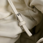 The Row Bourse Small Grained Leather Bag | 23cm Drawstring Dumpling Bag | Cream Pebbled Calfskin Crossbody
