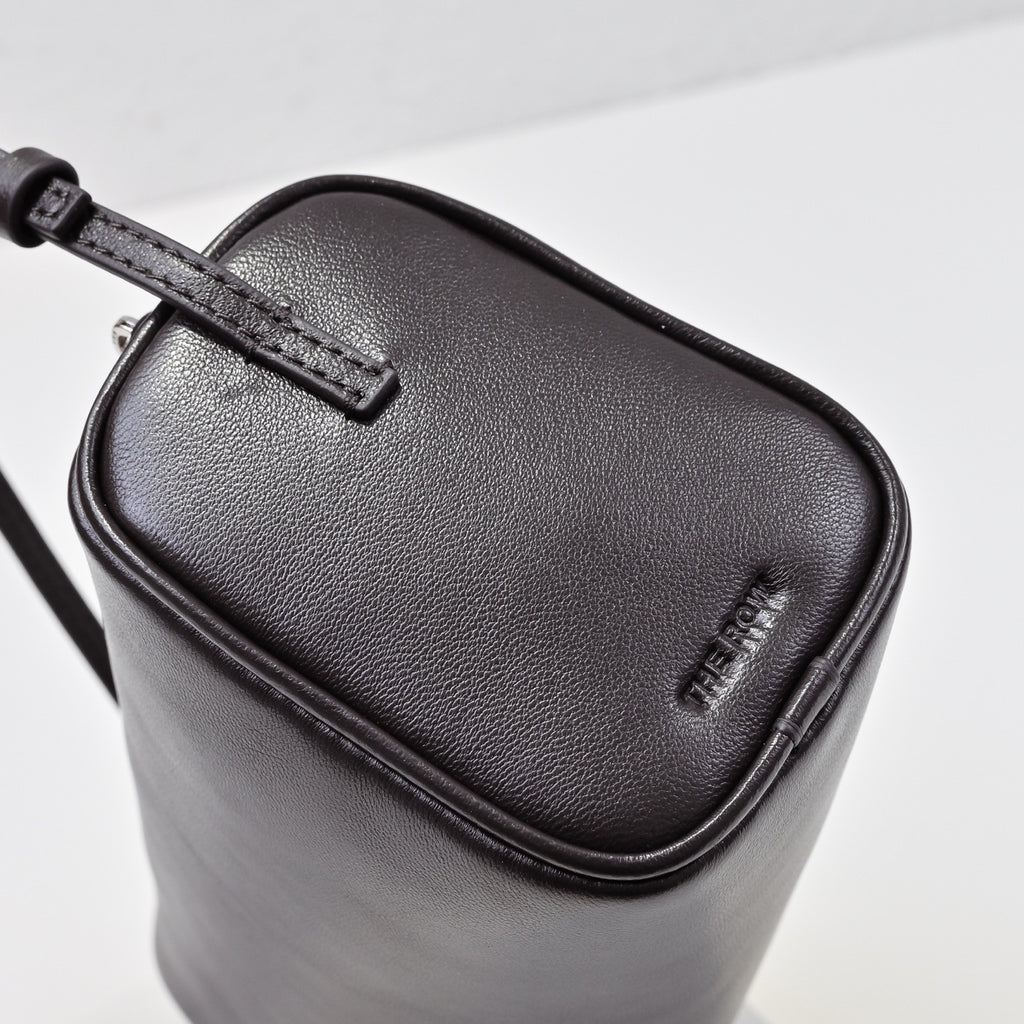 The Row Edith Barrel Bag | Small Grained Calf Leather Cylinder Bag | Black Shoulder Bag