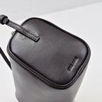 The Row Edith Barrel Bag | Small Grained Calf Leather Cylinder Bag | Black Shoulder Bag