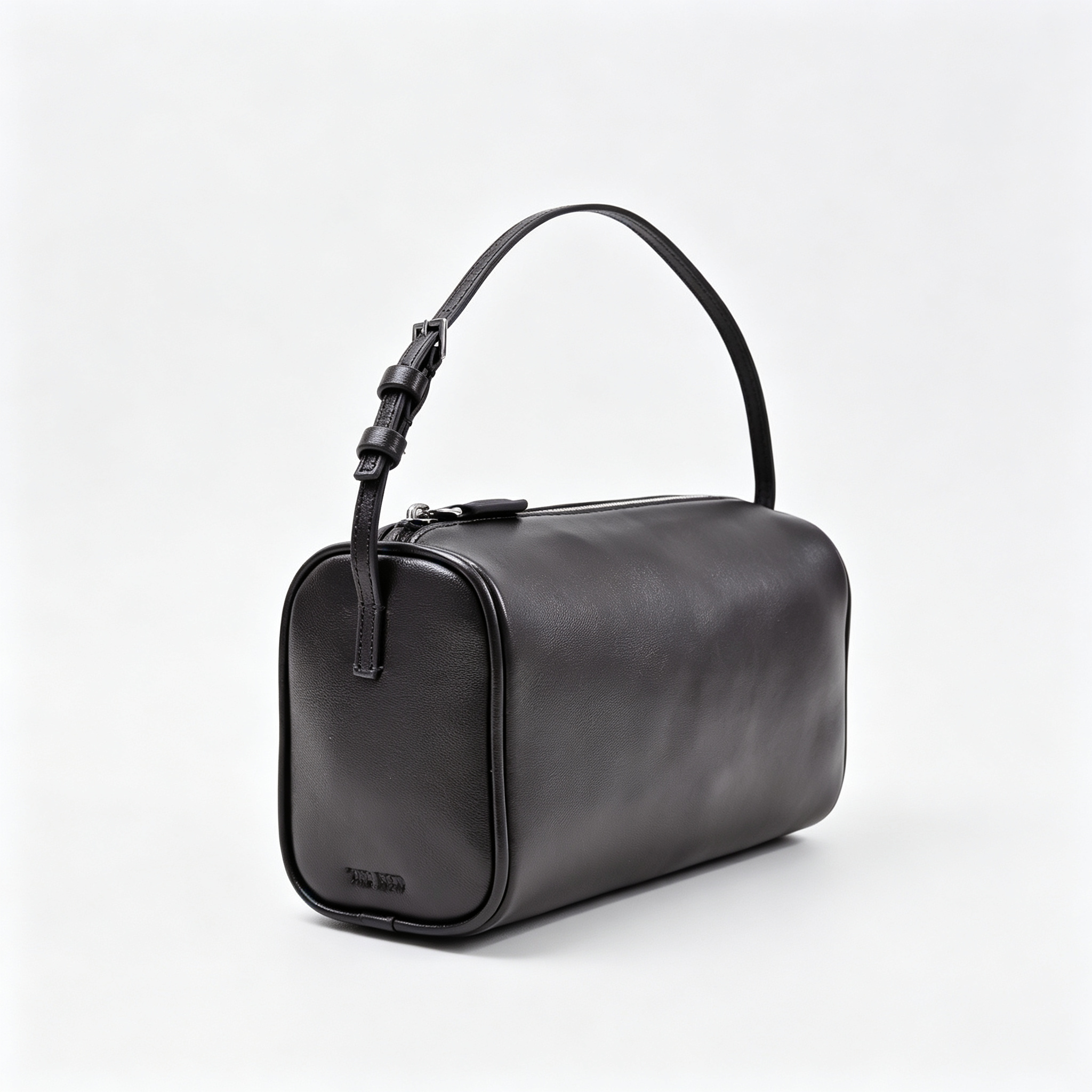 The Row Edith Barrel Bag | Small Grained Calf Leather Cylinder Bag | Black Shoulder Bag