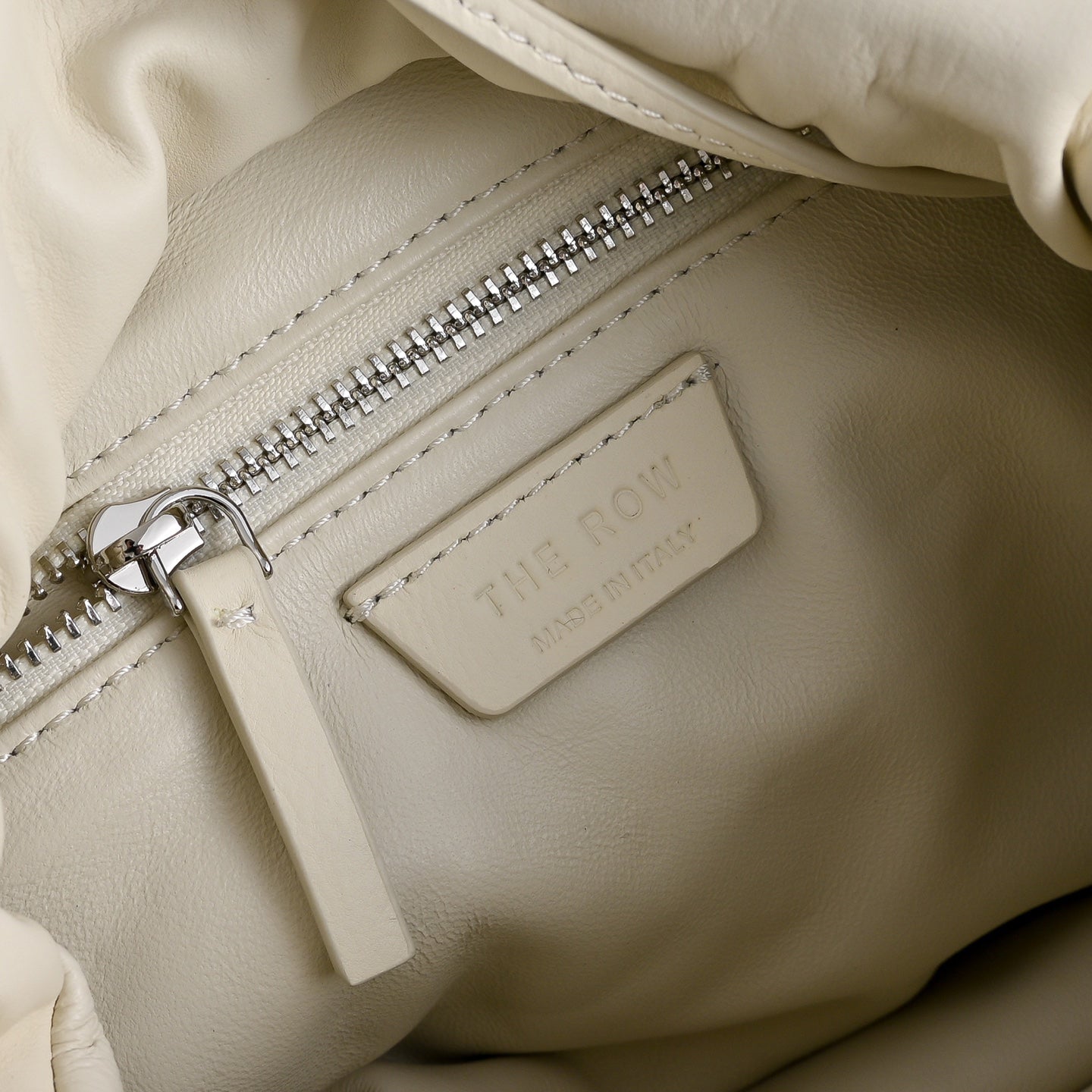 The Row Bourse Small Grained Leather Bag | 23cm Drawstring Dumpling Bag | Cream Pebbled Calfskin Crossbody