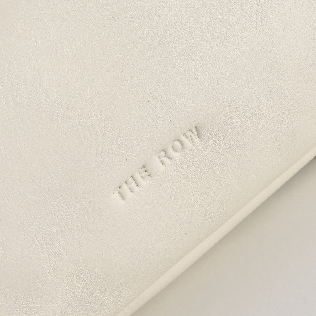 The Row Bourse Small Grained Leather Bag | 23cm Drawstring Dumpling Bag | Cream Pebbled Calfskin Crossbody