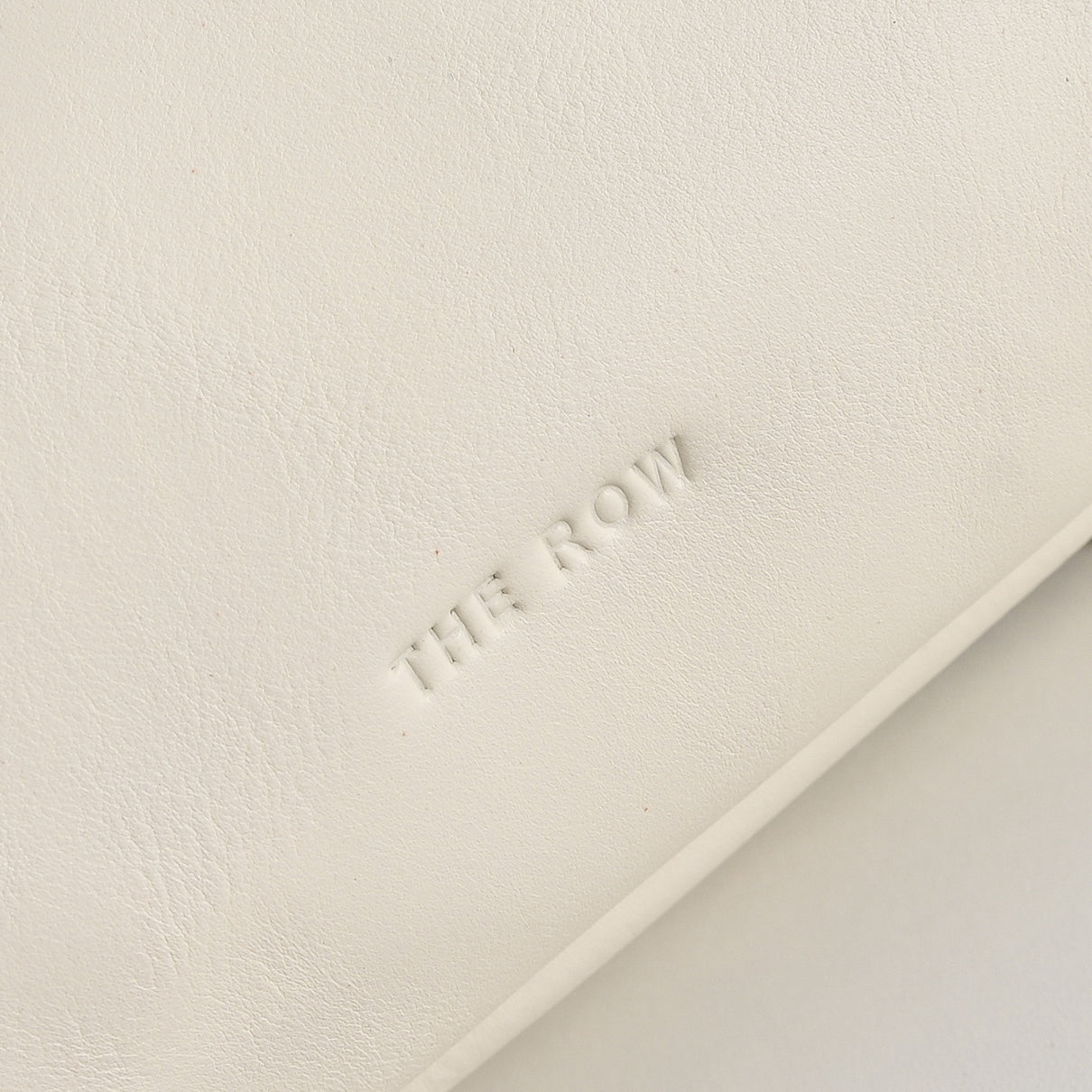The Row Bourse Small Grained Leather Bag | 23cm Drawstring Dumpling Bag | Cream Pebbled Calfskin Crossbody