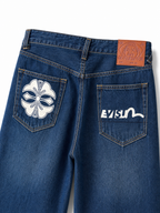 Evisu Men's Wide-Leg Jeans with Floral Appliqué – Mid-Blue Wash & Signature Branding