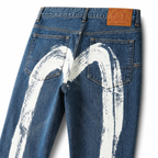 Evisu Men's Oversized Brushstroke Big M Jeans – Medium Wash Distressed Denim