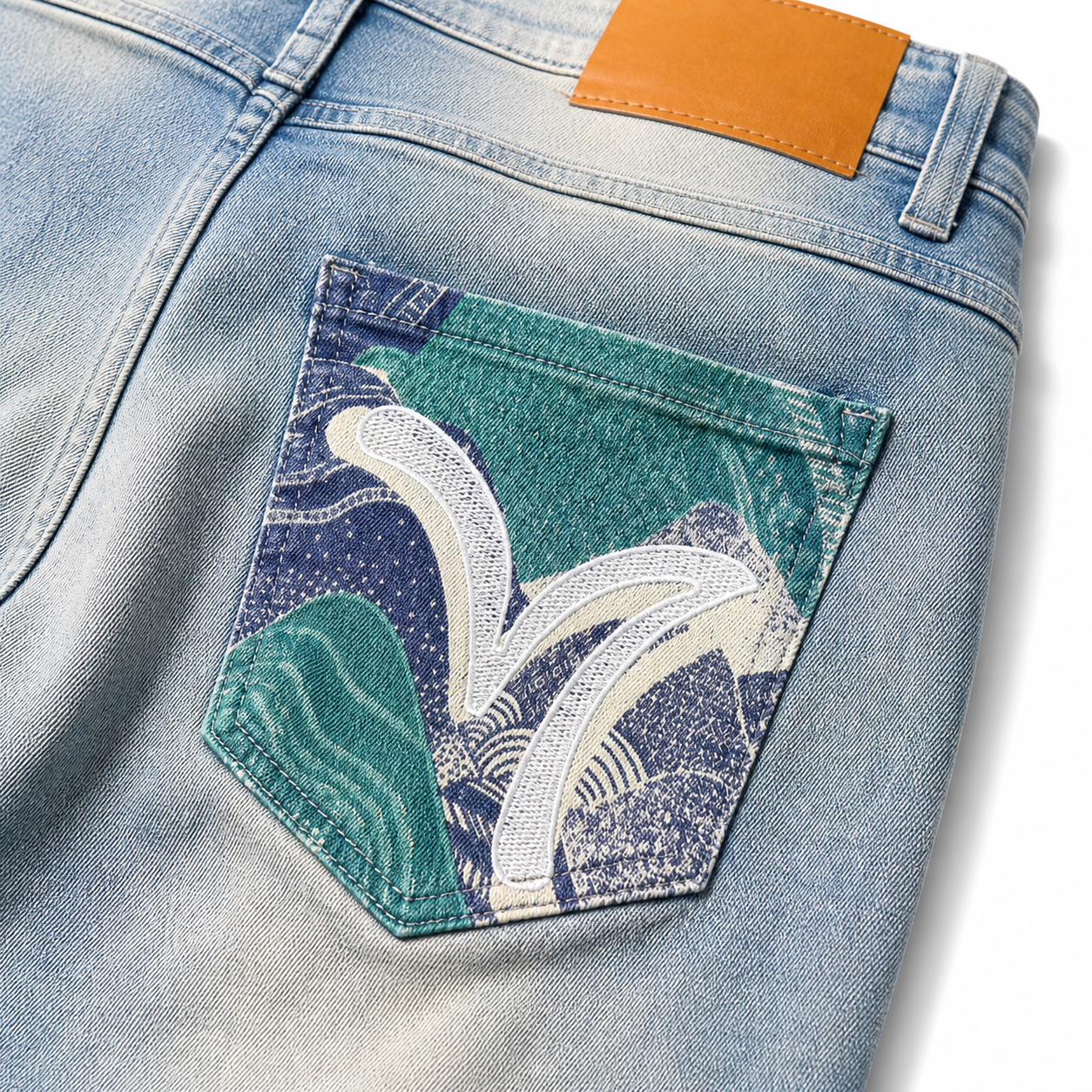 Evisu Men's "Ocean Wave" Patchwork Seagull Jeans – Light Wash Japanese Denim
