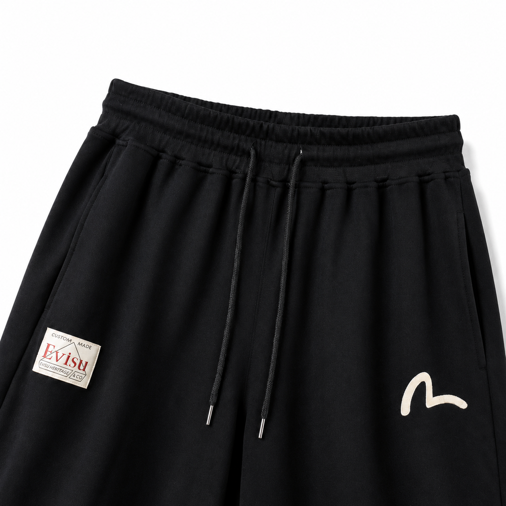 EVISU Sports Shorts featuring "Origin" Motif Combination Print and Maneki-neko Embroidery