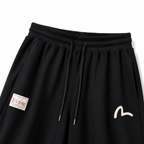 EVISU Sports Shorts featuring "Origin" Motif Combination Print and Maneki-neko Embroidery