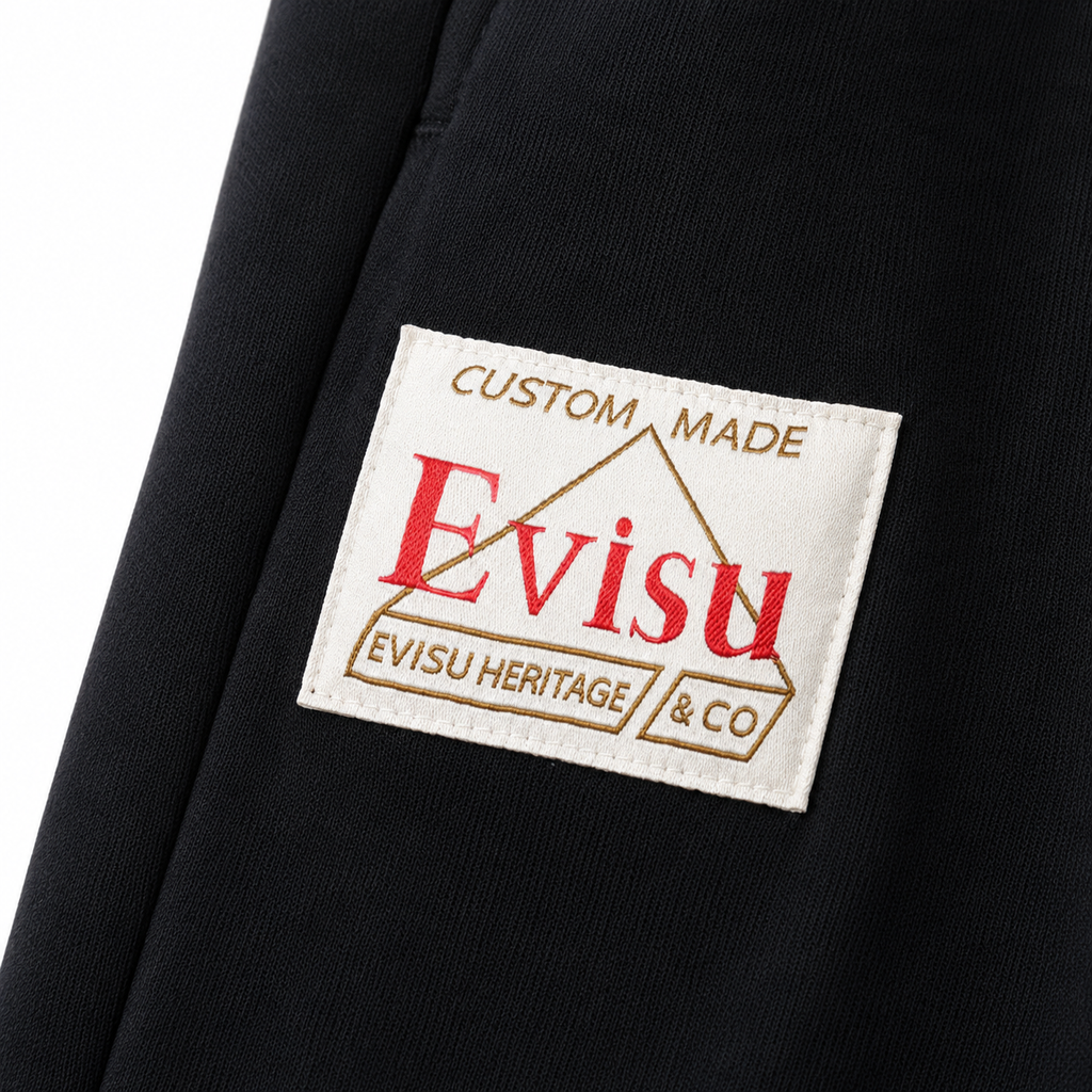 EVISU Sports Shorts featuring "Origin" Motif Combination Print and Maneki-neko Embroidery