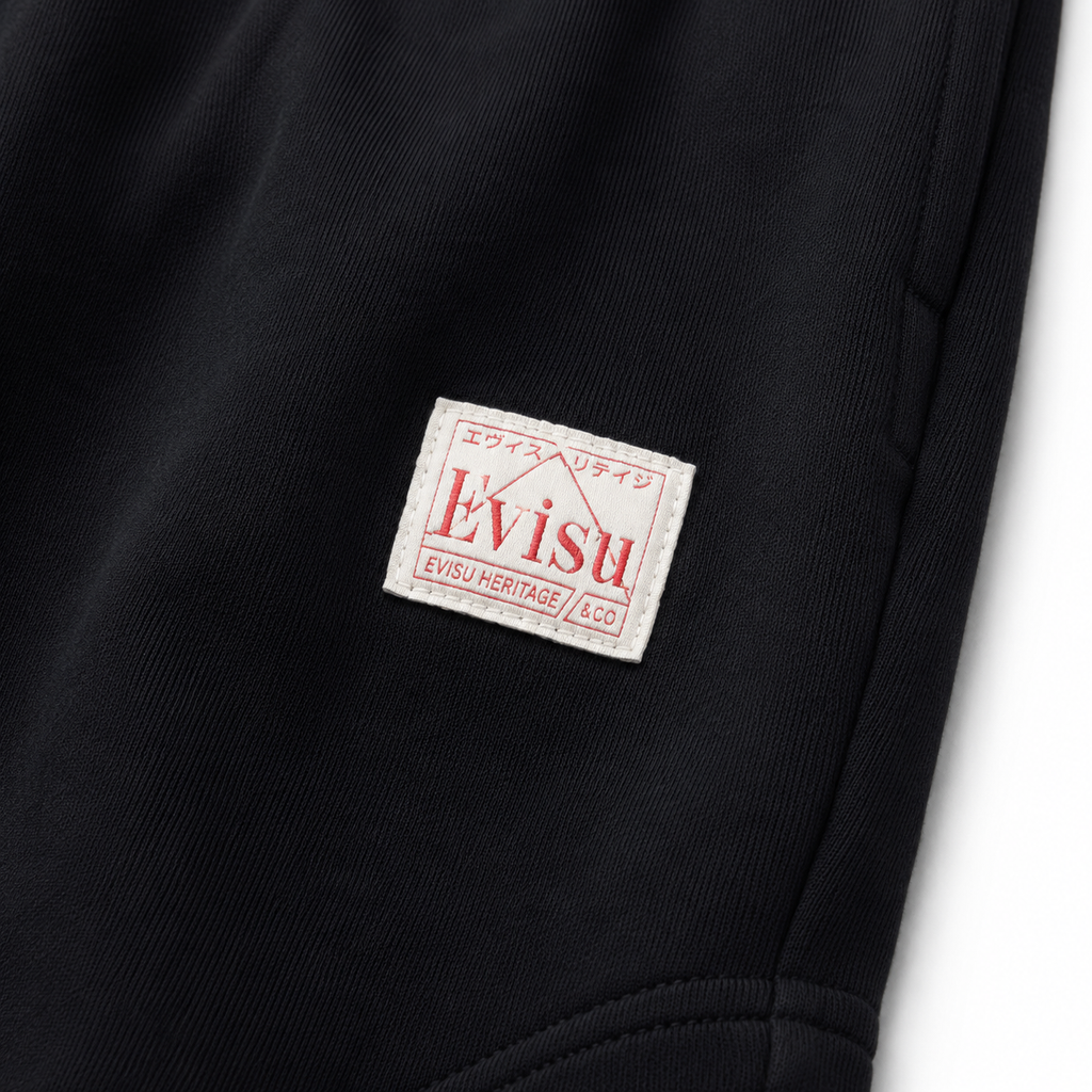 EVISU Solid-Color Athletic Shorts with Large "M" Print