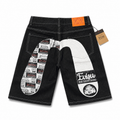 EVISU Denim Shorts featuring a Distressed, Paneled "Big M" Print
