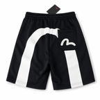 EVISU Sports Shorts with Brushstroke "Big M" Print