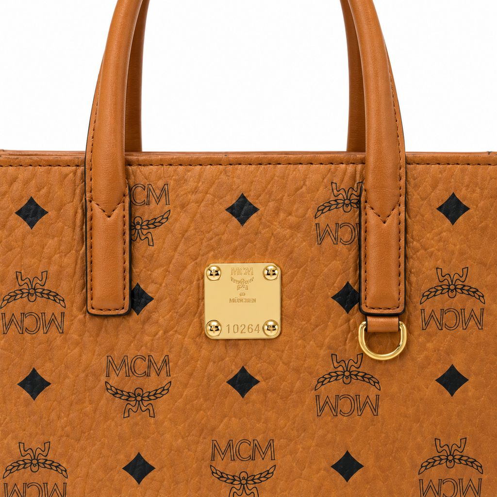 MCM Klassik Visetos Mini Tote – Cognac Monogram, Gold Plate, 3-Way Strap