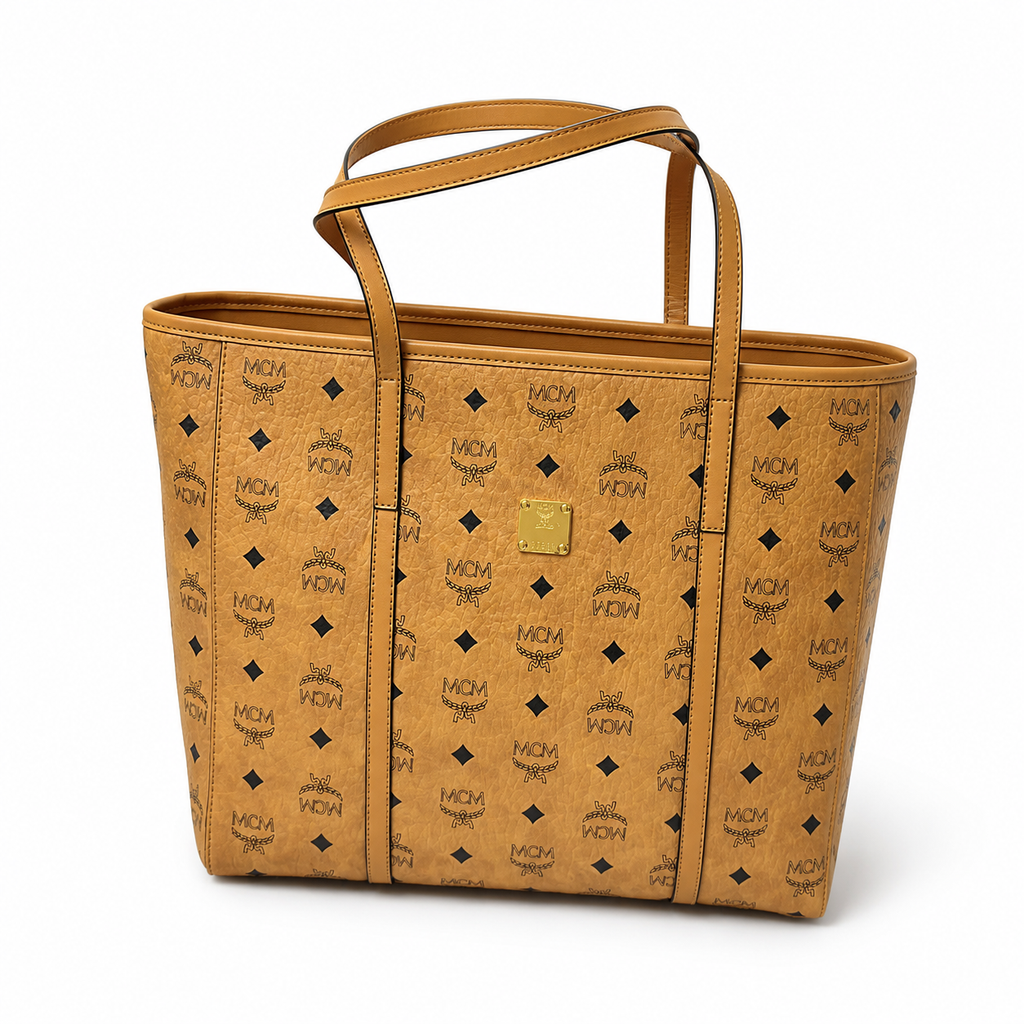 MCM Toni Visetos Tote Bag – Medium Cognac Monogram, Gold Plaque, Leather Handles