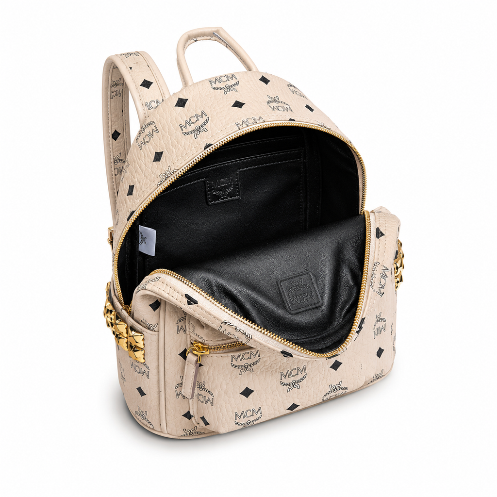 MCM Stark Mini Backpack in Beige Visetos – Signature Monogram Side Studs Backpack, MMK6SVE41IG001, 26x21.5x10.5cm