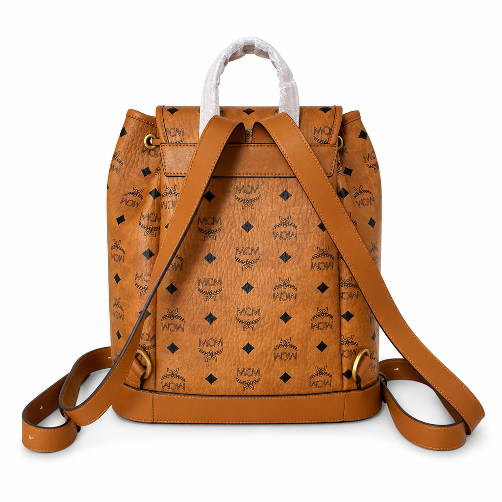 MCM Aren Backpack in Cognac Visetos – Drawstring Flap Buckle Monogram Backpack, 31.5x29x13cm