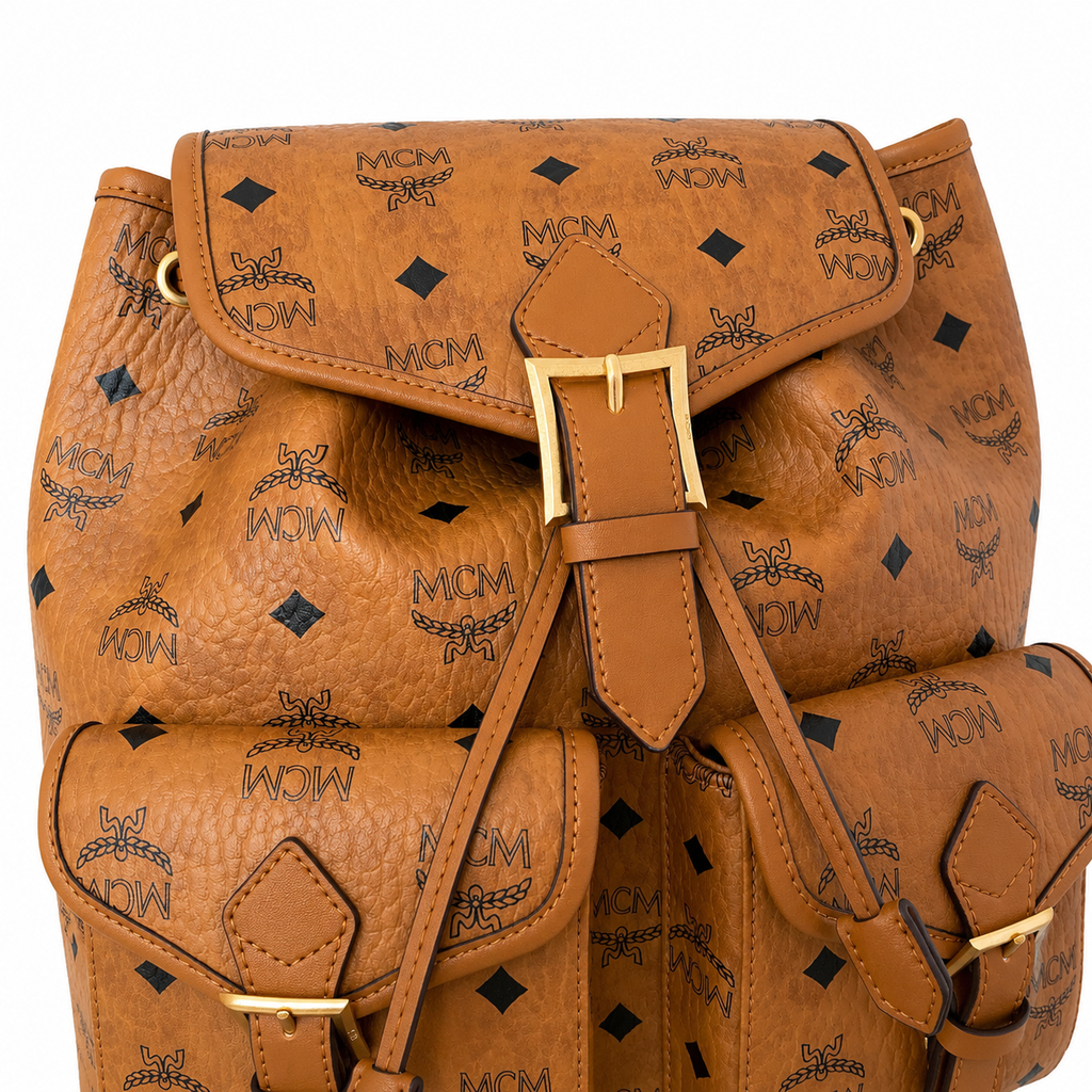 MCM Aren Backpack in Cognac Visetos – Drawstring Flap Buckle Monogram Backpack, 31.5x29x13cm
