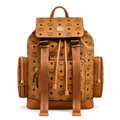MCM Small Brandenburg Backpack in Cognac Visetos – Drawstring Flap Monogram Backpack with Gold Hardware, 28x38x13cm