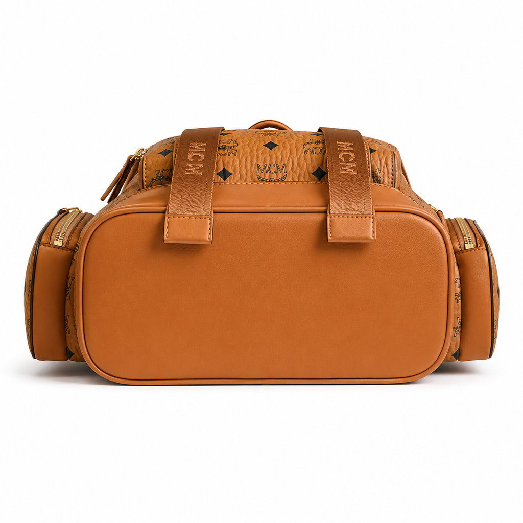 MCM Small Brandenburg Backpack in Cognac Visetos – Drawstring Flap Monogram Backpack with Gold Hardware, 28x38x13cm