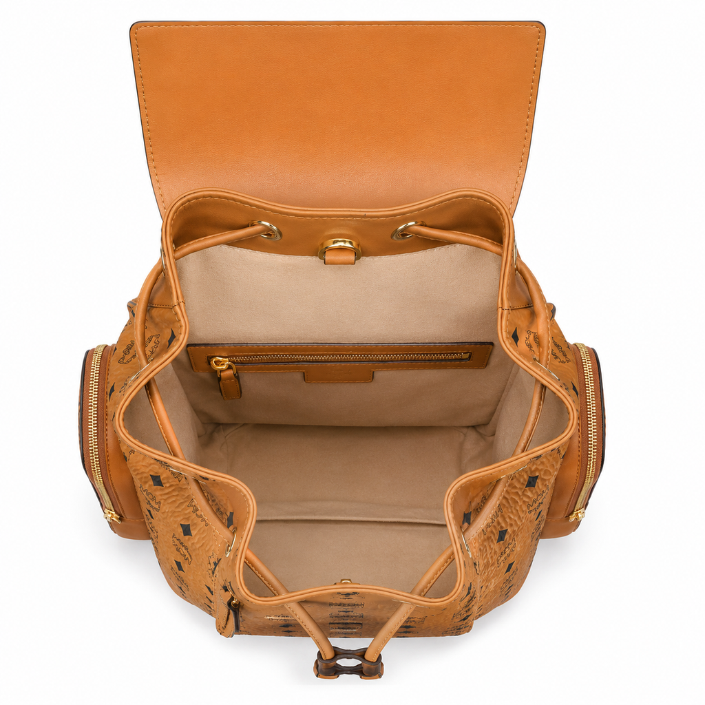 MCM Small Brandenburg Backpack in Cognac Visetos – Drawstring Flap Monogram Backpack with Gold Hardware, 28x38x13cm