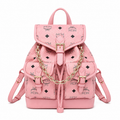 MCM Aren Mini Drawstring Chain Backpack in Peach Pink Visetos – Signature Monogram with Gold Chain Detail