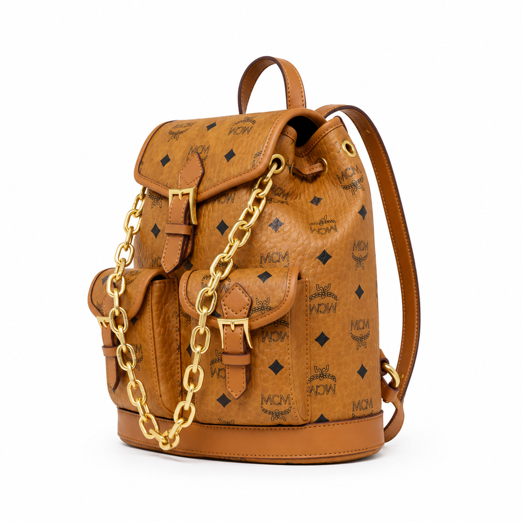 MCM Aren Mini Drawstring Chain Backpack in Cognac Visetos – Signature Monogram with Gold Chain Detail