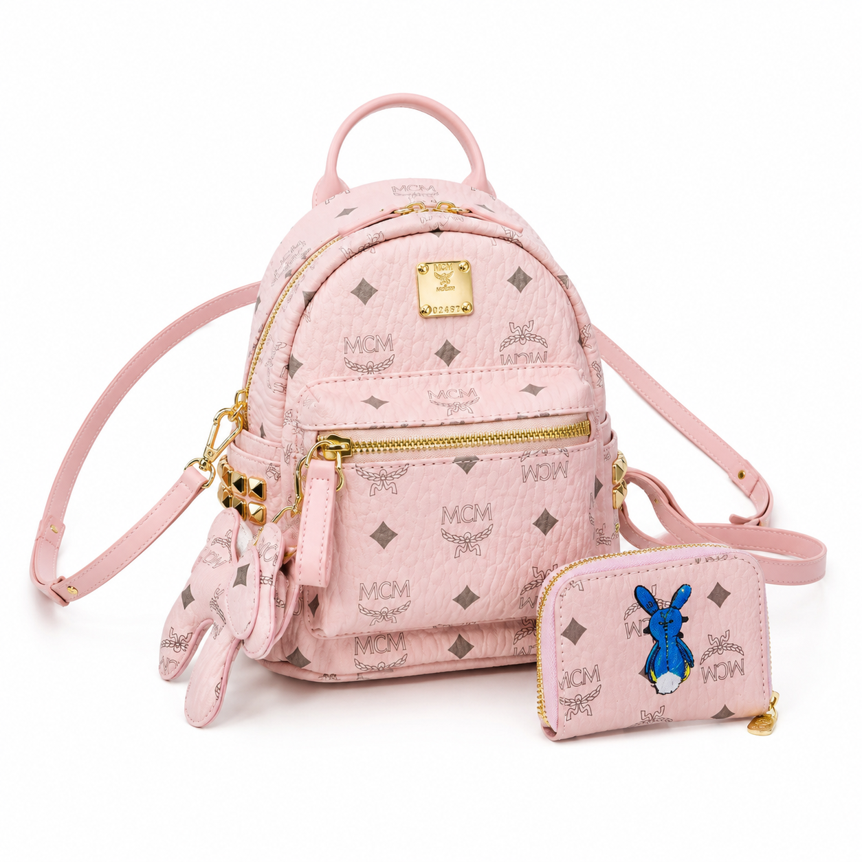 MCM Mini Stark Backpack in Blush Pink Visetos – Signature Monogram Leather Rucksack with Gold Hardware, 20x11x21cm