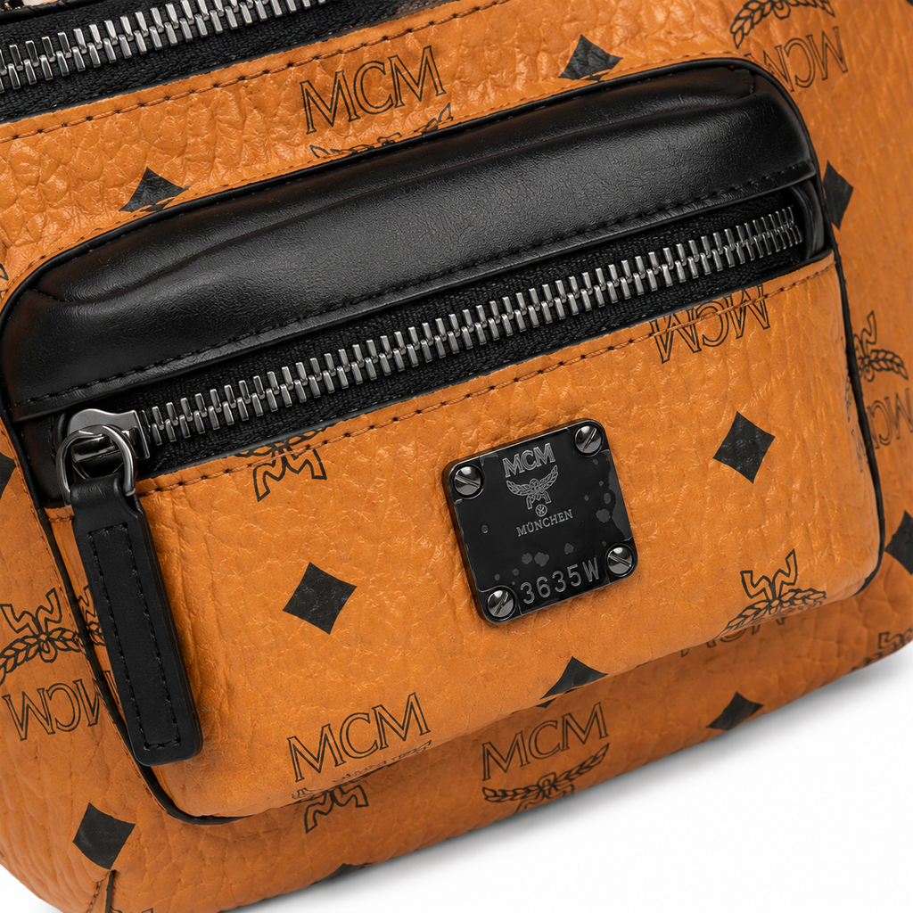 MCM Fursten Visetos Waist Bag in Cognac – Monogram Coated Canvas Belt Bag with Front Zip Pocket & Silver Plaque, 28.5x12.5x5.5cm