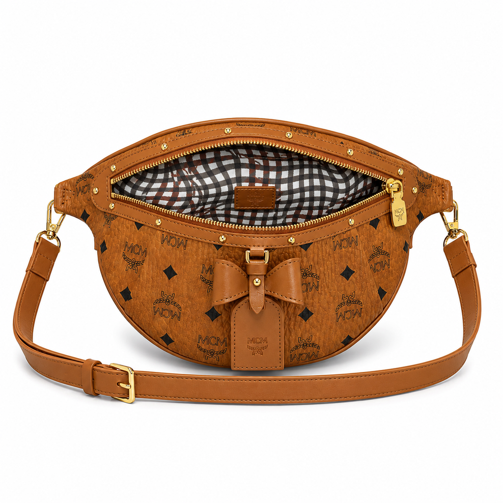 MCM Visetos Belt Bag with Bow in Cognac – Monogram Coated Canvas Waist Bag with Leather Bow, Rivets & Detachable Leather Strap, 25x18cm