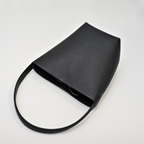 The Row N/S Park Small Tote Bag | 20cm Pebbled Calfskin Bucket Bag | Black Leather Shoulder Tote