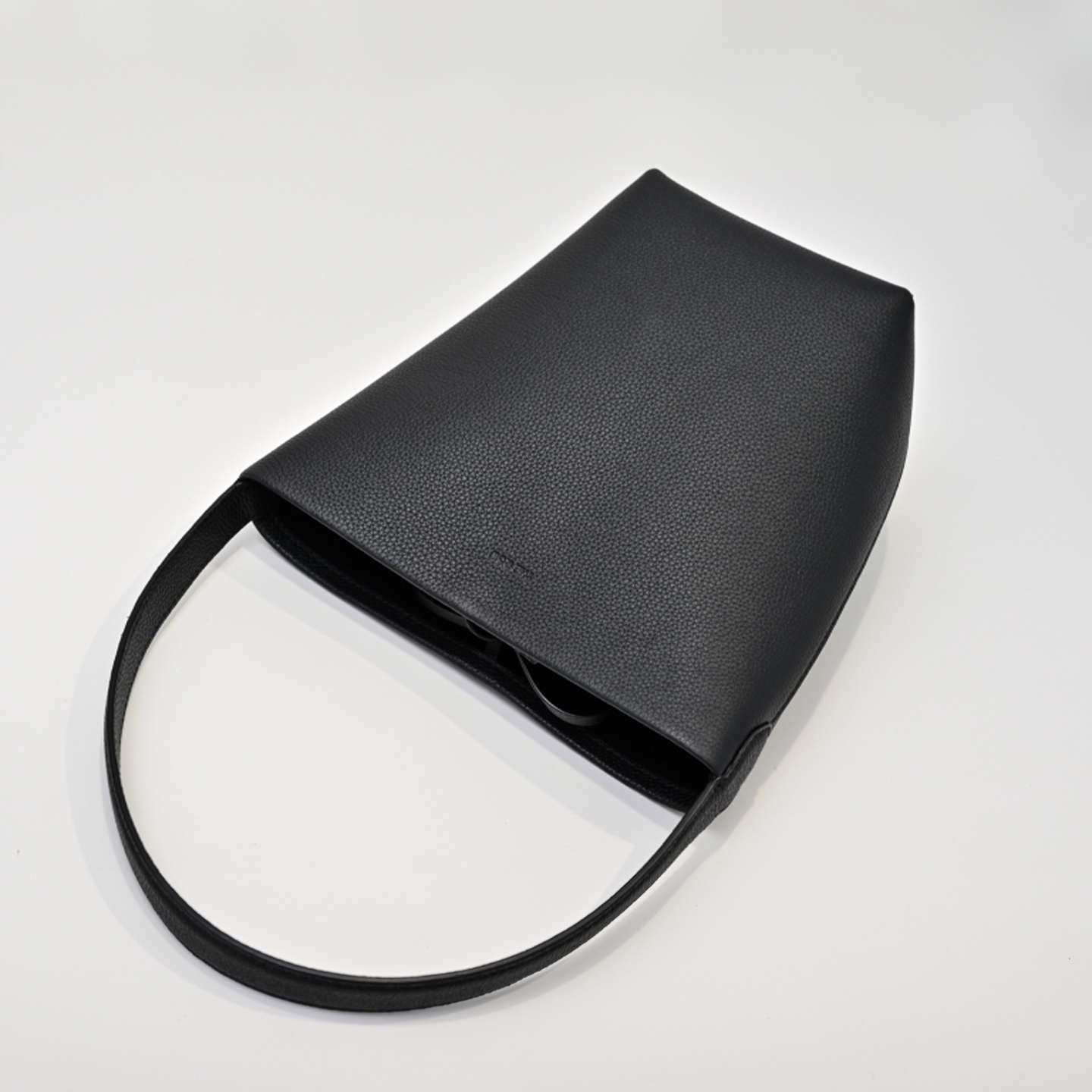 The Row N/S Park Small Tote Bag | 20cm Pebbled Calfskin Bucket Bag | Black Leather Shoulder Tote