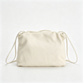 The Row Bourse Small Grained Leather Bag | 23cm Drawstring Dumpling Bag | Cream Pebbled Calfskin Crossbody