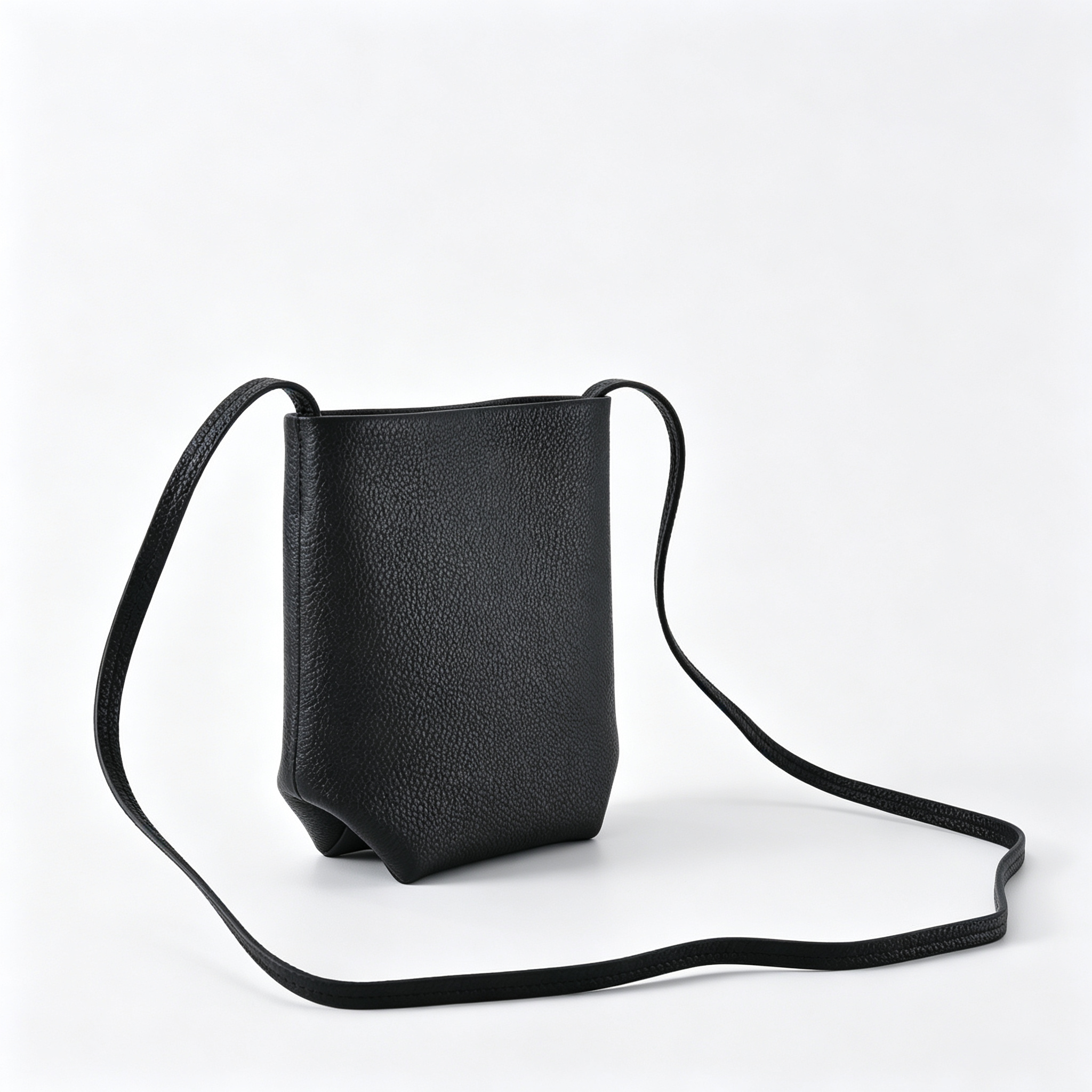 The Row N/S Park Mini Bucket Bag – Minimalist Leather Crossbody with Adjustable Strap,