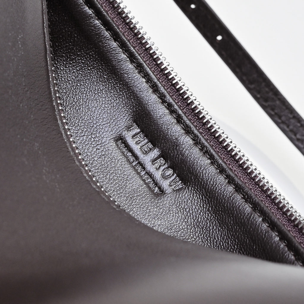 The Row Edith Barrel Bag | Small Grained Calf Leather Cylinder Bag | Black Shoulder Bag